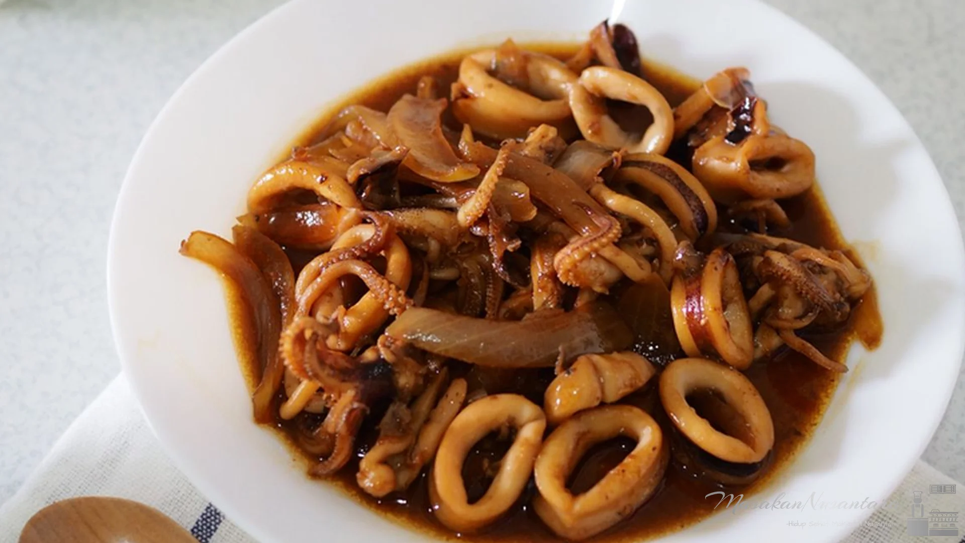 Kelezatan Nasi Cumi Saus Mentega dengan 4 Rahasia Rasa Gurih